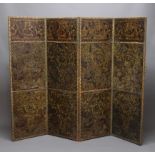 EMBOSSED LEATHER FOUR FOLD SCREEN, 19th century, Spanish or Italian, each fold with three panels