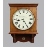 WALNUT WALL CLOCK, the 11 1/2" dial inscribed JJ Elliott/Little Gray's Inn Lane/London/69617, on a