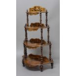 VICTORIAN ROSEWOOD SERPENTINE FOUR TIER WHATNOT, inlaid with birds and foliage on barleytwist