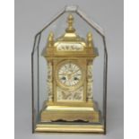 FRENCH BRASS AND ENAMELLED MANTEL CLOCK, the dial on a brass eight day movement striking to a