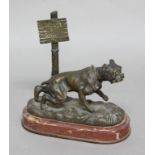 FRENCH SCHOOL, Parlez au Garde, a bulldog chained to a post on a naturalistic base, bronze on a