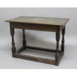OAK SIDE OR ALTER TABLE, probably 17th century, the rectangular top above carved frieze on turned