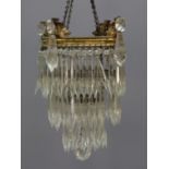 CUT GLASS BAG CHANDELIER, with three tiers of lustres, height 33cm, diameter 17cm