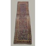 NORTH WEST PERSIAN RUNNER, Iranian Azerbaijan, circa 1900, the indigo lattice field containing