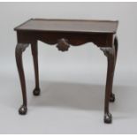 IRISH MAHOGANY SILVER TABLE, 19th century, the slightly trayed, rectangular top above shell carved