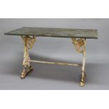 VICTORIAN CAST IRON GARDEN TABLE, the rectangular slate top on scrolling supports, height 76cm,
