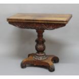 VICTORIAN ROSEWOOD FOLDOUT TEA TABLE, with carved frieze and column on quadripartite base and