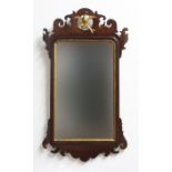 GEORGE III FRET CARVED WALL MIRROR, the rectangular plate with parcel gilt border beneath a gilt