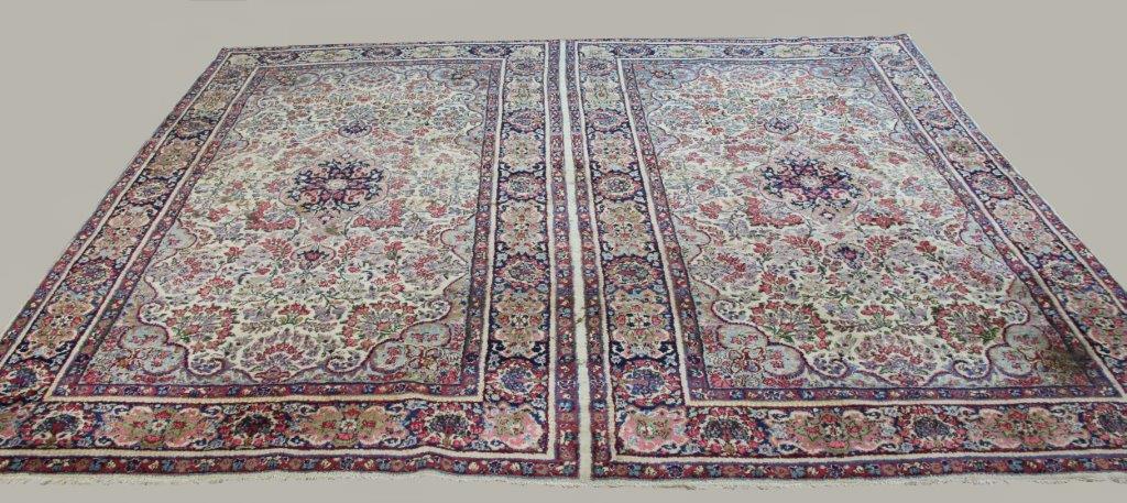 KIRMAN CARPET, South East Iran, circa 1940, woven as one piece in the format of rugs, each with an