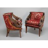 PAIR OF EMPIRE STYLE MAHOGANY TUB CHAIRS, 20th century, with a curved back above carved swan arms
