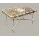 CAST IRON GARDEN TABLE, the lattice work top with a central roundel on a scrolling base, height