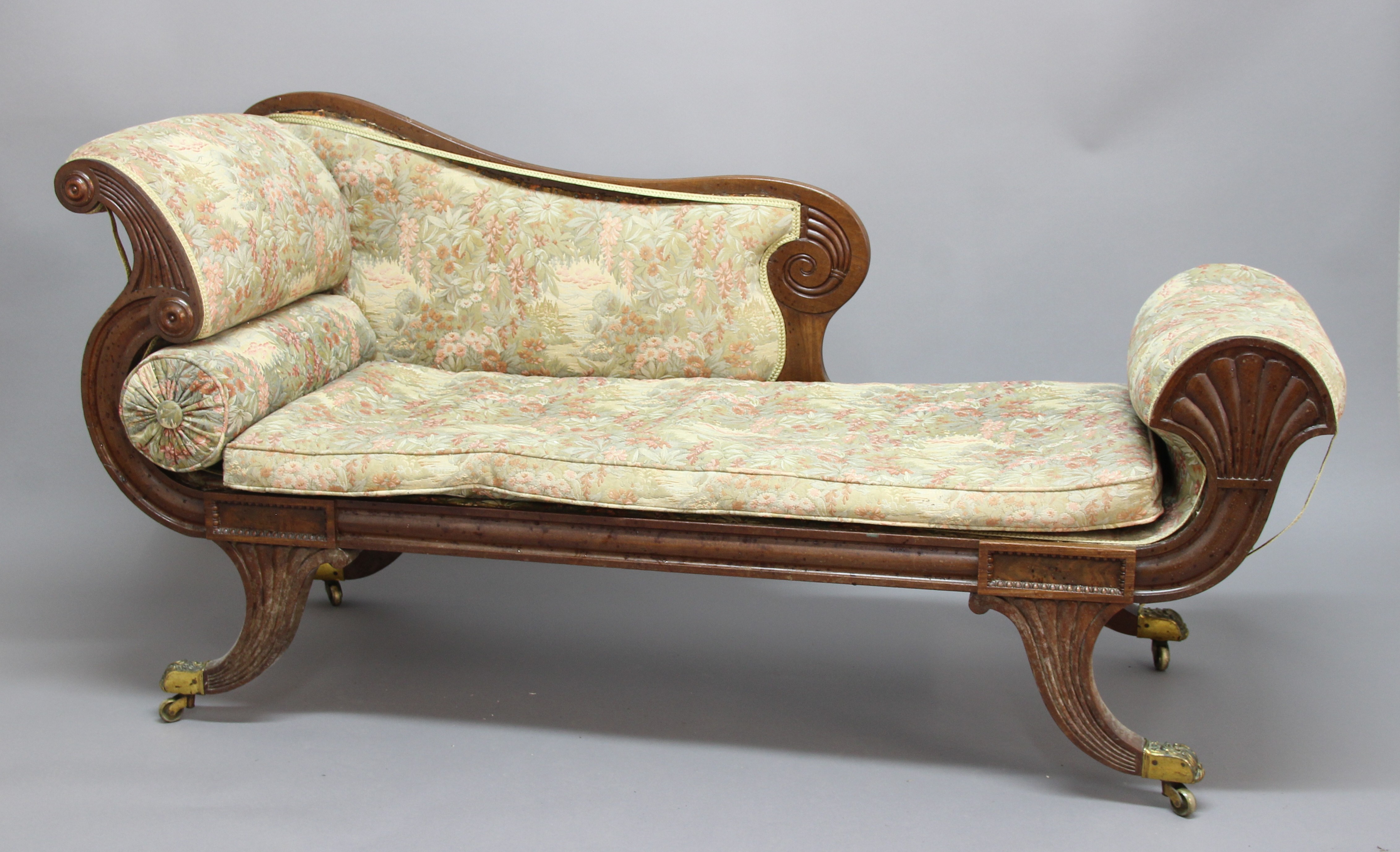 REGENCY MAHOGANY CHAISE LONGUE, with a scrolling back rest, arms and legs, height 90cm, width 178cm,