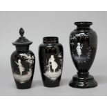 GROUP OF THREE BLACK MARY GREGORY STYLE GLASS VASES, each enamelled with a young lady in a rural