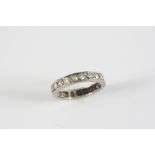 A DIAMOND FULL CIRCLE ETERNITY RING millegrain set with circular-cut diamonds. Size P