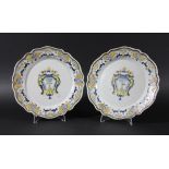 PAIR OF FRENCH FAIENCE ARMORIAL PLATES, late 18th or early 19th century, the crest of an eagle