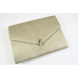 A SILK EVENING BAG BY CARTIER the grey silk bag with turquoise lining, indistinctly signed in gold