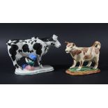 NORTH COUNTRY COW CREAMER, the black and white cow with milkmaid beside, length 19.5cm; together