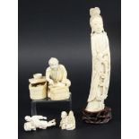 IVORY OKIMONO, later 19th century, of a geisha pouring water from a vase, signature to base,