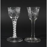 GEORGIAN WINE GLASS, the ogee bowl with fruiting vine engraving on a stem with a white enamel spiral