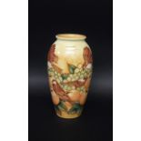 MOORCROFT VASE - FINCHES & FRUIT a modern boxed Moorcroft vase in the Finches & Fruit design on an