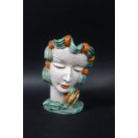 GOLDSCHEIDER FACE MASK ON STAND - RUDOLF KNORLEIN an unusual terracotta face mask designed by Rudolf