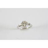 A DIAMOND SOLITAIRE RING the round brilliant-cut diamond weighs approximately 1.40 carats and is set