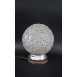 ART DECO GLASS LAMP with a large circular frosted glass shade with star burst design, with a metal