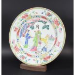 CHINESE FAMILLE ROSE CHARGER, 19th century, a central garden scene of two figures and a deer