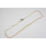 A SINGLE ROW GRADUATED NATURAL AND CULTURED PEARL NECKLACE the pearls graduate from 2.3mm to 6.0mm