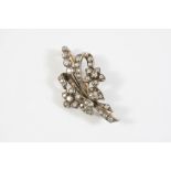A VICTORIAN DIAMOND SPRAY BROOCH set overall with graduated old circular-cut diamonds, in silver and