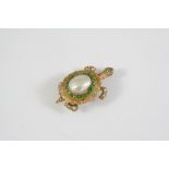 A GOLD, DIAMOND, PEARL AND DEMANTOID GARNET TURTLE BROOCH the body formed with a blister pearl,