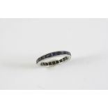 A SAPPHIRE FULL CIRCLE ETERNITY RING mounted with calibre-cut sapphires. Size L 1/2