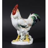 MEISSEN COCKEREL, 20th century, with red comb and coloured plumage, blue crossed sword marks, height