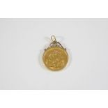 A GOLD SOVEREIGN 1914, in a 9ct gold pendant mount, total weight 9.4 grams