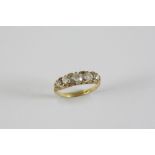 A VICTORIAN DIAMOND FIVE STONE RING the five graduated old brilliant-cut diamonds are set with