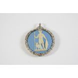 AN ANTIQUE WEDGWOOD PLAQUE depicting a warrior, mounted as a pendant within a rose-cut diamond