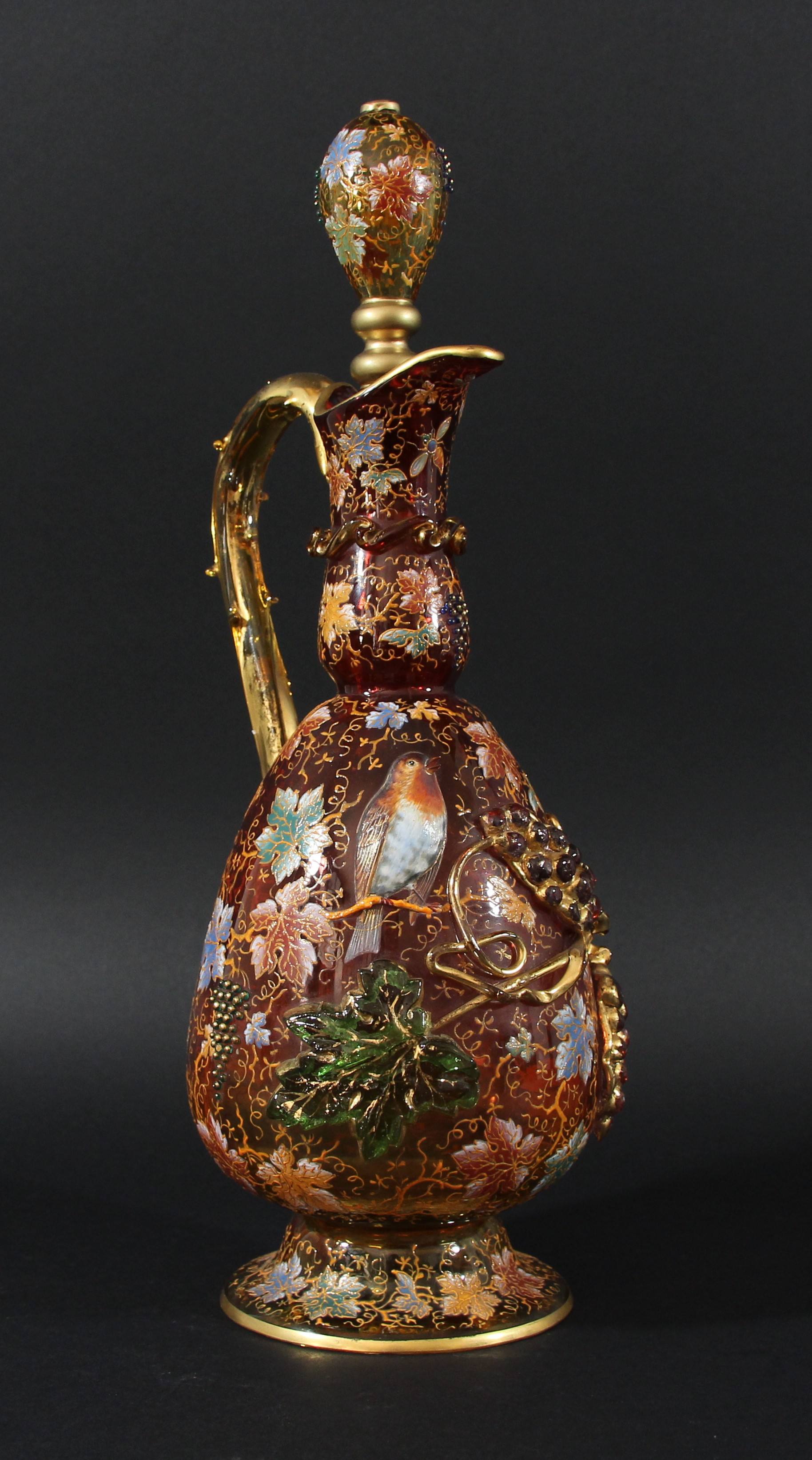 MOSER AMBERINA GLASS EWER OR PITCHER AND STOPPER, late 19th century, the ovoid body graduating