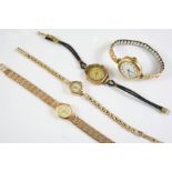 A LADY'S 9CT GOLD WRISTWATCH BY ACCURIST the signed oval shaped dial with baton numerals, on an