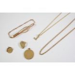 A QUANTITY OF GOLD JEWELLERY including a 9ct gold chain necklace, three 9ct gold pendants, a gold