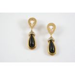 A PAIR OF BLACK ONYX AND DIAMOND DROP EARRINGS each black onyx drop is mounted with circular-cut