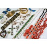 A QUANTITY OF JEWELLERY including a lady's gold wristwatch by Accurist, assorted coral necklaces,