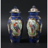 PAIR OF WORCESTER STYLE BLUE SCALE VASES AND COVERS, possibly Samson, painted with panels of