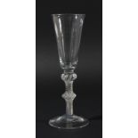 GEORGIAN ALE GLASS, circa 1750, the rounded funnel bowl on a multiple strand air twist stem with