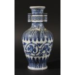 CHINESE BLUE AND WHITE ARROW VASE, Republic period, painted with scrolling foliage between bands