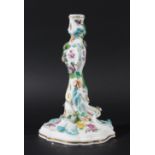 MEISSEN ROCOCO STYLE CANDLESTICK, 19th century, with applied and painted floral decoration,