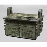 CHINESE BRONZE ARCHAISTIC CENSER, fang ding, of rectangular, two handled form, decorated with