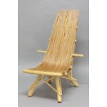 CONTEMPORARY RUSTIC CHAIR - GUY MARTIN an unusual chair with a curved woven seat, supported on a