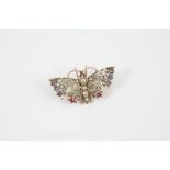 A VICTORIAN DIAMOND AND GEM SET BUTTERFLY BROOCH the body set with graduated half pearls, the