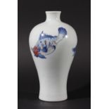 CHINESE BLUE, WHITE AND COPPER RED MEIPING VASE, painted with three fish to the body, height 19cm