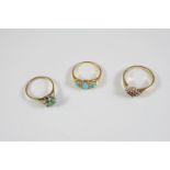A TURQUOISE AND DIAMOND RING the three graduated oval-shaped turquoise cabochons are set with four